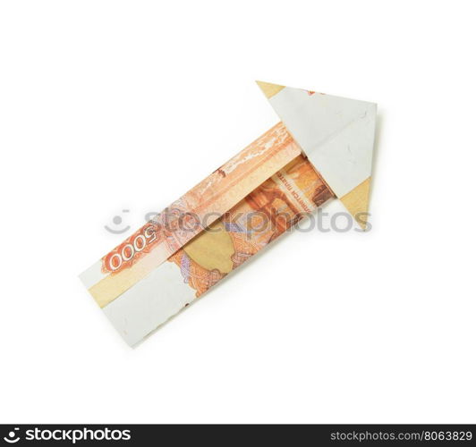 rubles arrow origami. Arrow origami made of rubles bills on a white background