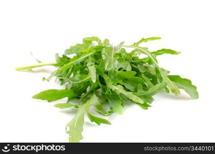 Ruccola salad fresh heap leaf isolated on a white