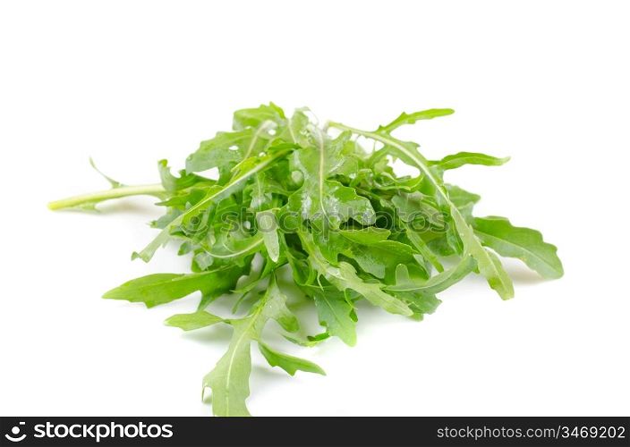 Ruccola salad fresh heap leaf isolated on a white