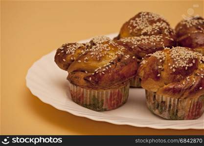 Ruddy cakes with sesame seeds