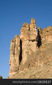 Rugged cliffs of rock formations and spire in remote area