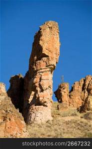 Rugged cliffs of rock formations and spire in remote area