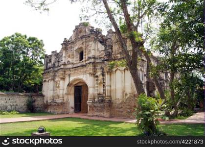 Ruined church in green park in Antigua Guatemala