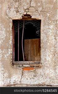Ruined window of an abandoned house