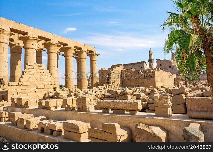 Ruins and colonnade in Luxor Temple, Egypt. Ruins and colonnade