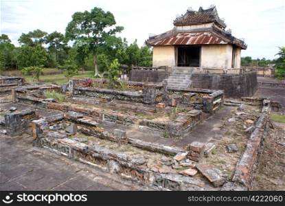 Ruins and pavilion in Royal tomb complex near Hue, Vietnam