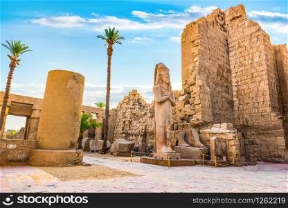 Ruins in Karnak Temple at sunny sunrise, Luxor. Ruins in Karnak Temple