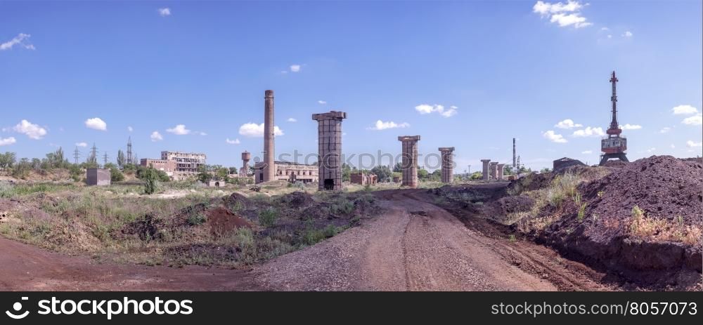 ruins of an old factory. panoramic shot of the old factory ruins against the sky