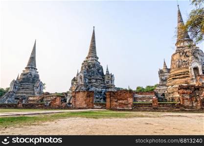Ruins of ancient architecture three pagoda of Wat Phra Si Sanphet old temple famous attractions at Phra Nakhon Si Ayutthaya Historical Park in Ayutthaya Province, Thailand