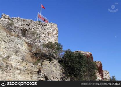 Ruins of ancient fortress on the rock in Egirdir, Turkey