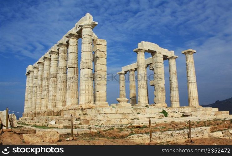 Ruins of ancient Greek Temple of Poseidon, god of the sea in ancient mythology. It is located at Cape Sounion, near Athens, Greece, and was built in ca.440 BC.
