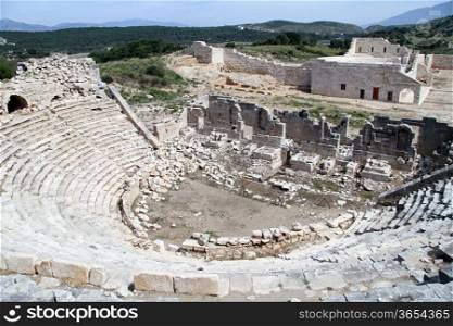 Ruins of ancient theater and odeon in Pstara, Turkey