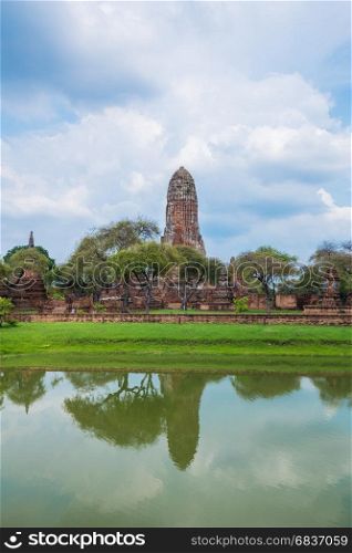 Ruins of buddha statues and pagoda of Wat Phra Ram temple in Ayutthaya historical park, Thailand