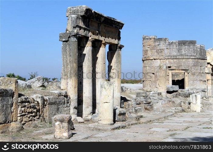 Ruins of columns and round tower in Hyerapolis, Turkey