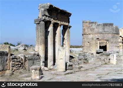 Ruins of columns and round tower in Hyerapolis, Turkey