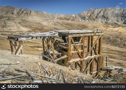 ruins of gold mine near Mosquito Pass in Rocky Mountains, Colorado - upper station of aerial tramway used to transport gold ore