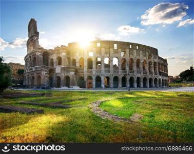 Ruins of great colosseum at the sunset