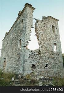 Ruins of large house on coast at Sivota Greece.