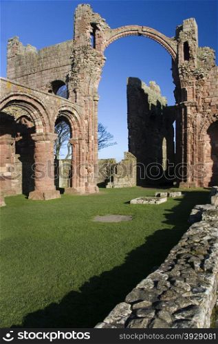 Ruins of Lindisfarne Priory on Holy Island on the Northumbria coast in northeast England.