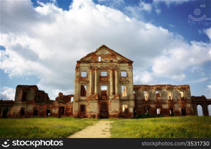 ruins of old palace under cloudy sky