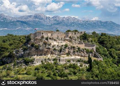 Ruins of old Venetian fort above the coastal town of Novigrad in Croatia. Fortress above the Croatian town of Novigrad in Istria County