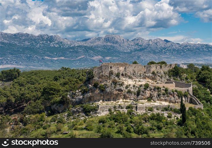 Ruins of old Venetian fort above the coastal town of Novigrad in Croatia. Fortress above the Croatian town of Novigrad in Istria County