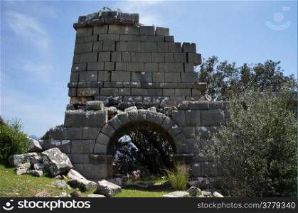 Ruins of south gate of ancient town Pednelissus in Turkey