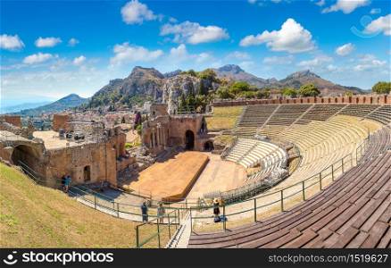 Ruins of the ancient Greek theater in Taormina, Sicily, Italy in a beautiful summer day