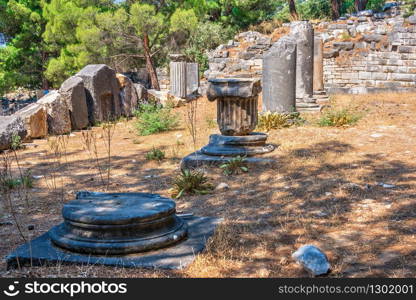 Ruins of the Ancient Theatre in the greek city of Priene in Turkey on a sunny summer day. Ancient Greek city Priene on the western coast of Turkey