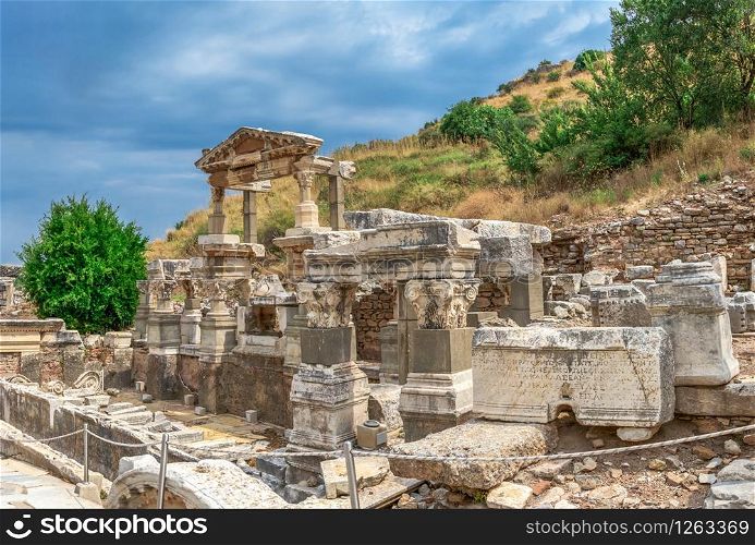 Ruins of The Fountain of Trajan in antique Ephesus city on a sunny summer day. The Fountain of Trajan in Ephesus, Turkey