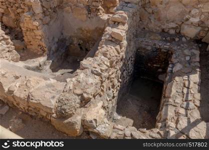 Ruins of the rjewish ritual bath in ancient Masada fortress in Israel,build by Herod the great. Ruins of the ancient Masada