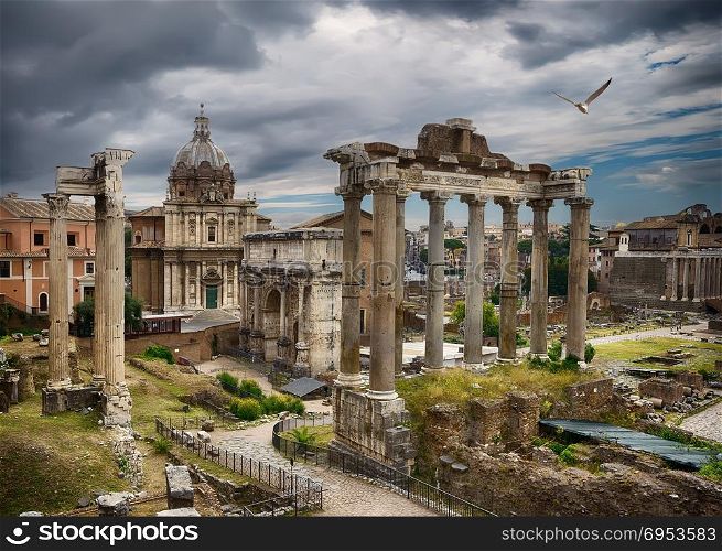 Ruins of the Roman Forum and thunderclouds