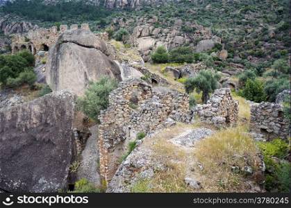 Ruins of Yediler monastery on the slope in Turkey