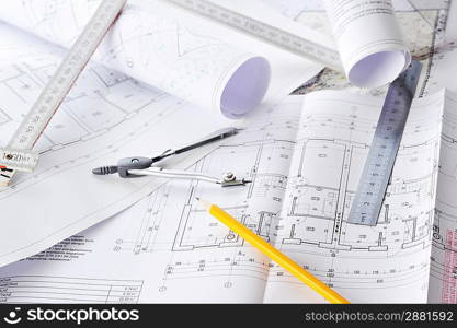 Ruler, eraser, glasses and a pencil on the floor plan - Bussines a still-life