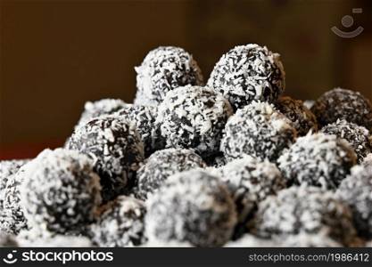 Rum balls. Traditional Czech Christmas cookies. Cocoa coated in coconut.