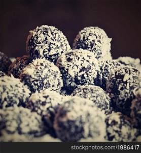 Rum balls. Traditional Czech Christmas cookies. Cocoa coated in coconut.