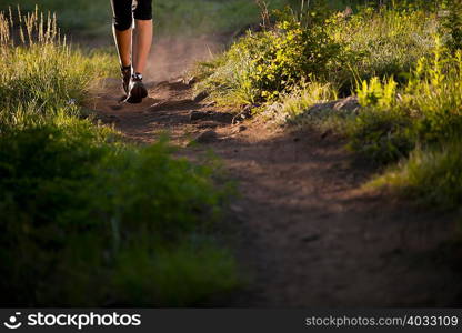 Runner on Bloods Lake trail near Guardsman Pass, Wasatch Mountains, Utah, USA