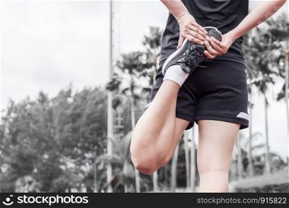 Runner stretching warm up before exercise, Sport and activity concept