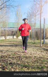 Runner woman jogging at the park