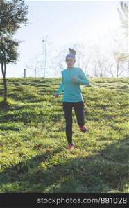 Runner woman jogging at the park