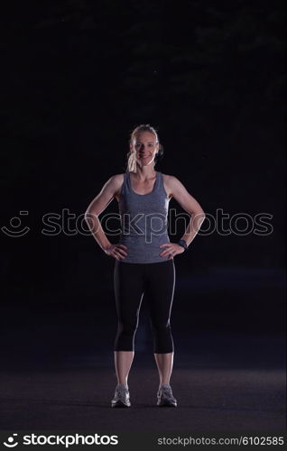 runner woman warming up and stretching before morning jogging