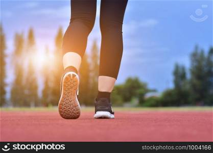 Runner women are running exercise sporty morning sunlight