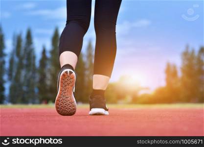 Runner women are running exercise sporty morning sunlight