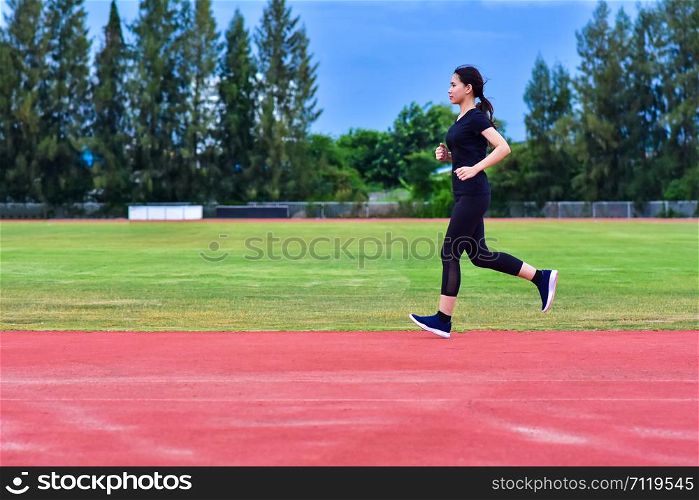 Runner Women jogging or running in evening at sunlight,Lady run jogging or exercise,Woman Runner or Girl Running