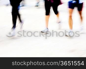 Runners legs with panning blur. horizontal frame.