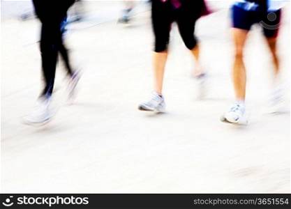 Runners legs with panning blur. horizontal frame.
