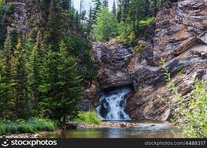 Running Eagle Falls in Glacier National park in Montana,USA