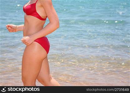 running girl body on beach