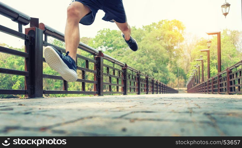 running man. Male runner at sprinting speed training for marathon outdoors.