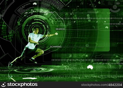 Running man. Young running man against digital media background